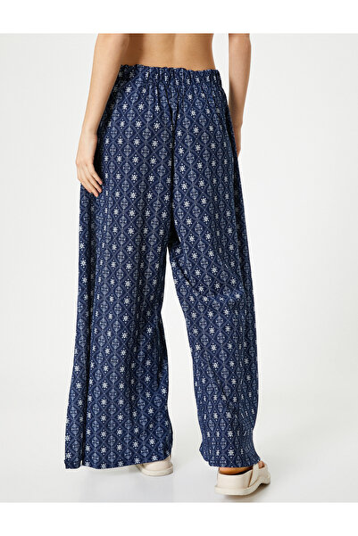 Koton Двобортні штани з етнічним візерунком, боковими розрізами та мішкуватим бурумом