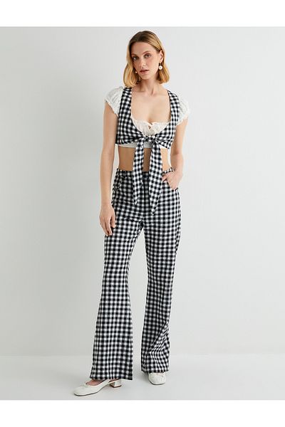Koton X Tuba Unusal - Slim Fit-Hose mit ausgestellten Beintaschen