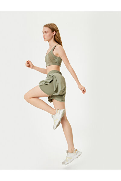 Koton Αθλητικό σορτς με άνετα σχέδια - κολάν και λεπτομέρεια με σκίσιμο