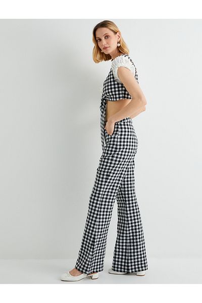 Koton X Tuba Unusal - Slim Fit-Hose mit ausgestellten Beintaschen