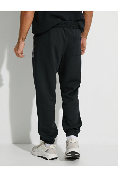 Koton Παντελόνι Jogger με κορδόνια στη μέση και λεπτομέρεια τσέπης με φερμουάρ