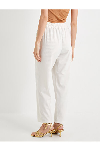 Koton Mrkvové kalhoty s krajkovým pasem s vysokým detailem kapsy v pase