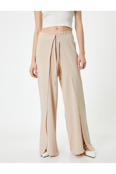 Koton Bol Paça Pantolon Kapaklı Bağlama Detaylı Beli Lastikli
