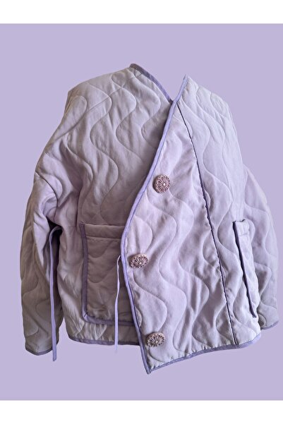 Pastelist. Özel tasarım kimono bağcıklı kapitone mont