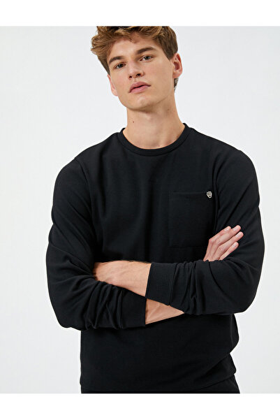 Koton Pullover mit Rundhalsausschnitt und Taschendetails, minimal bedruckt, lange Ärmel