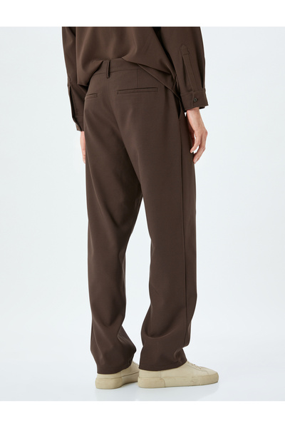 Koton Palazzo-Lose-Stoffhose mit Knopfleiste und Chino-Taschendetail