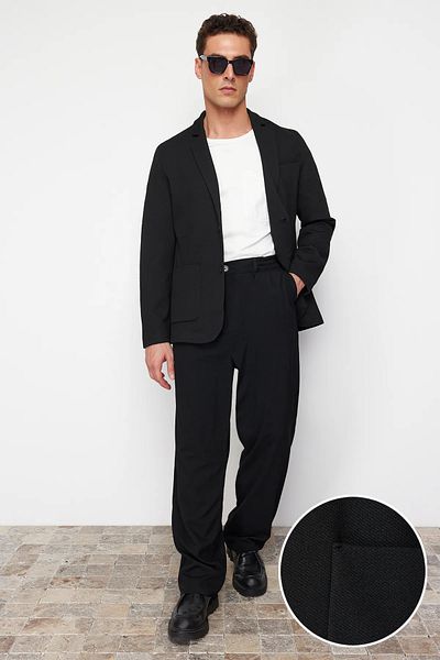 Trendyol Collection Schwarze Slim-Fit-Blazerjacke mit zwei Taschen TMNAW23CE00014