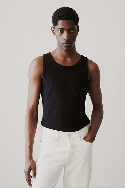 H&M قميص صدرية مضلعة بقصّة Slim Fit