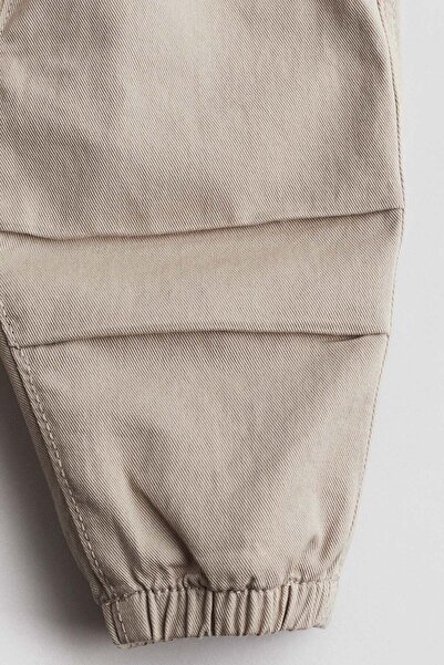 H&M بنطلون رياضي من القطن المائل