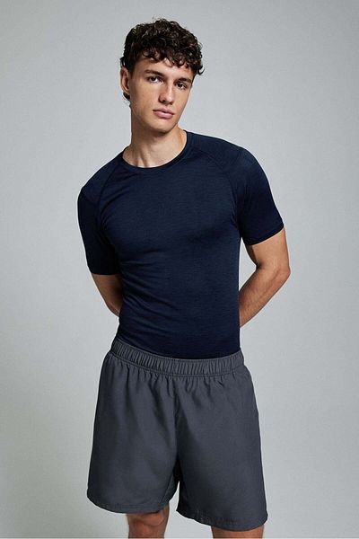 H&M قميص رياضي بأكمام قصيرة