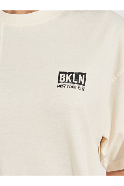 Styli Oversized Graphic Print T-Shirt with Dropped Shoulder