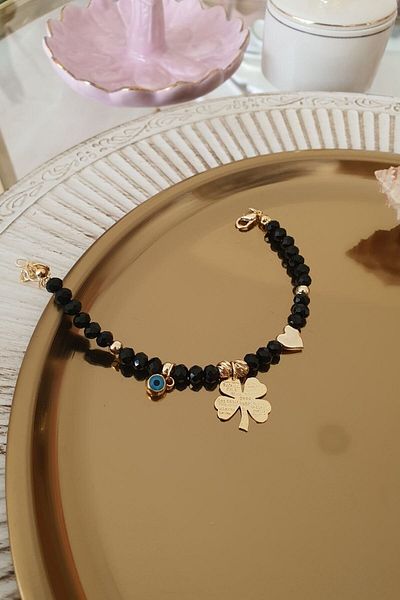 Trendy Butik سوار مزين بالكريستال الأسود ومزين بخرز عين الشر والبرسيم والقلب