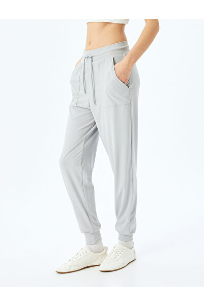 Koton Düşük Bel Dikiş Detaylı Cepli Beli Bağcıklı Jogger Eşofman Altı