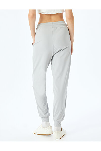 Koton Düşük Bel Dikiş Detaylı Cepli Beli Bağcıklı Jogger Eşofman Altı
