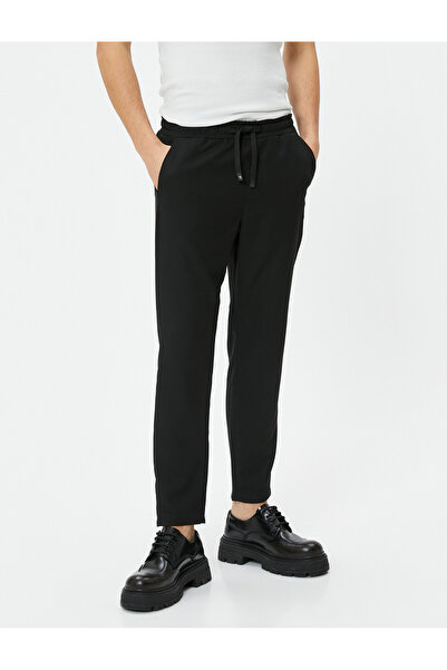 Koton Stoffhose mit Spitzenbund, schmaler Passform und Taschendetail