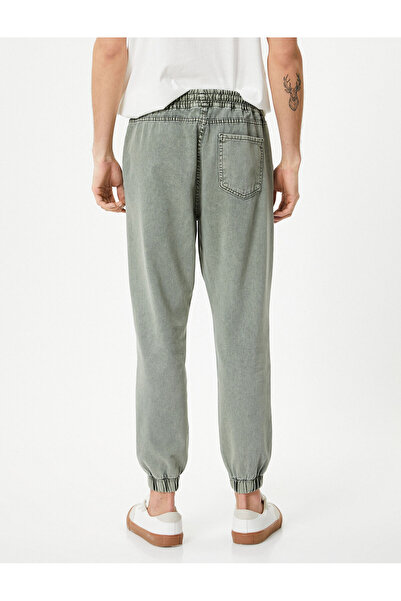 Koton Loose Jeans Jogger Washed με τσέπες στη μέση με κορδόνια