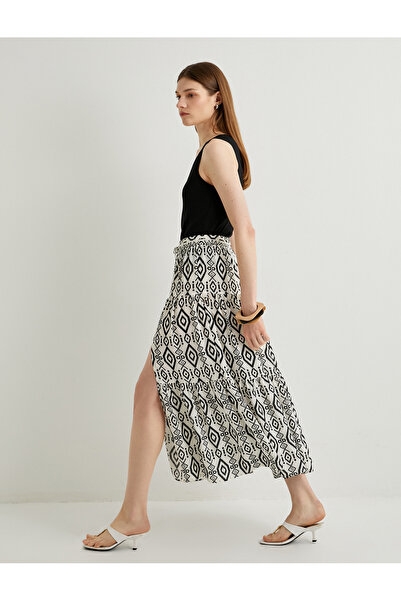 Koton Μίντι φούστα με σχισμή, λεπτομερή λεπτομέρεια, ελαστική μέση, έθνικ σχέ...