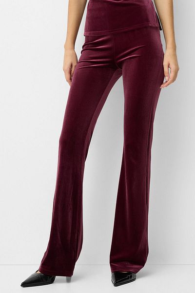 Bershka Flared velvet trousers
