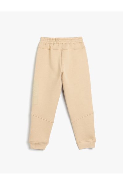 Koton Jogger-Jogginghose mit Slogan-Print, detaillierter Reißverschlusstasche, Taillenbinder