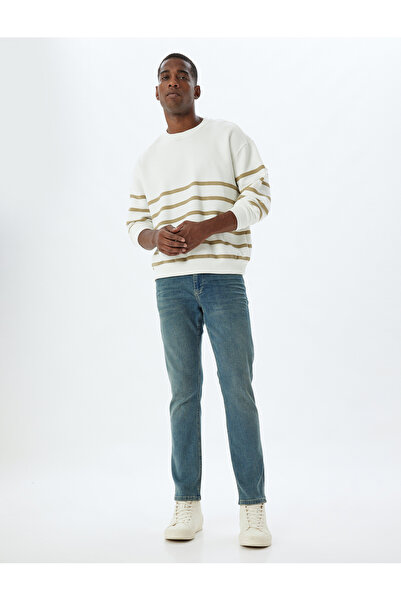 Koton بنطال جينز براد ذو قصة ضيقة باللون الأزرق الداكن للرجال