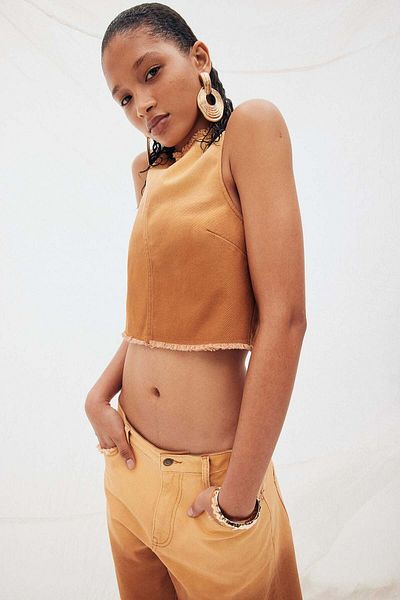 H&M بلوزة من قماش الدنيم متهالكة الحواف