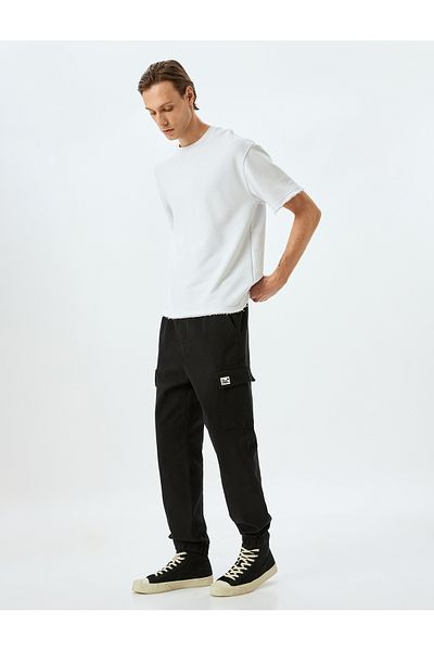 Koton Λεπτομερές παντελόνι Jogger με βαμβακερή γκαμπαρντίνα Cargo Pocket με κορδόνια στη μέση