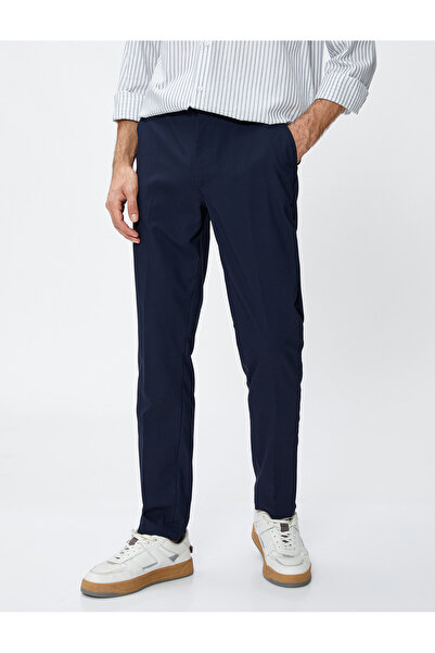 Koton Υφασμάτινο παντελόνι με λεπτή εφαρμογή - Λεπτομέρεια με κουμπιά και τσέπη