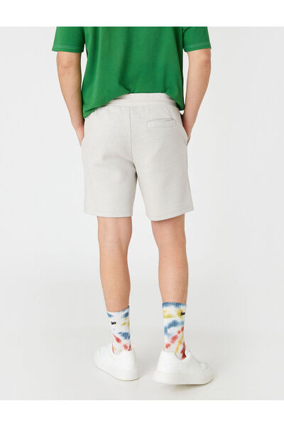 Koton Krajkové bermudy do pasu s detailem kapsy