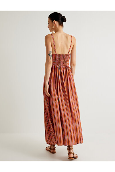 Koton Melis Ağazat - Dlouhé viskózové šaty s výstřihem do V, kapsami a podšívkou