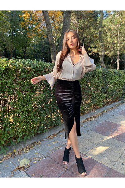 Butik Fusta cu pliuri în față de culoare catifea neagră