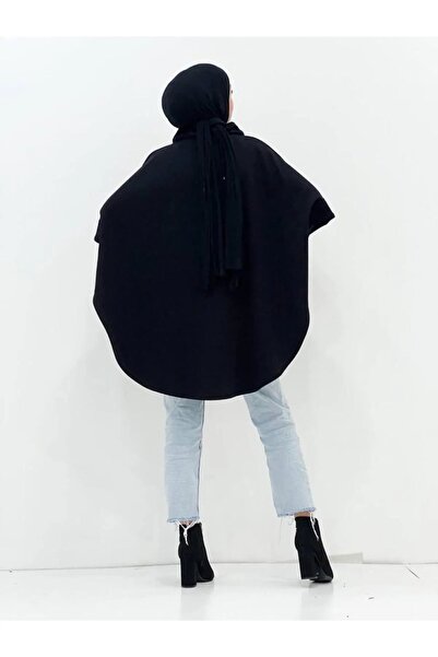 b buhari bykoc Γυναικείο πλεκτό πόντσο με γούνινο γιακά και μανίκια