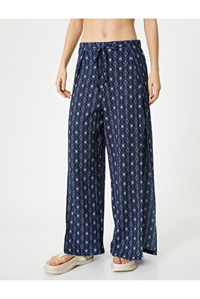 Koton Двобортні штани з етнічним візерунком, боковими розрізами та мішкуватим бурумом