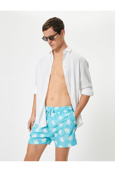 Koton Badeshorts mit Schildkröten-Print – Taschen und Schnürsenkel in der Taille