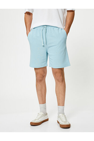 Koton Egyszerű szövött rövidnadrág fűzős derékkal és zsebrészlettel