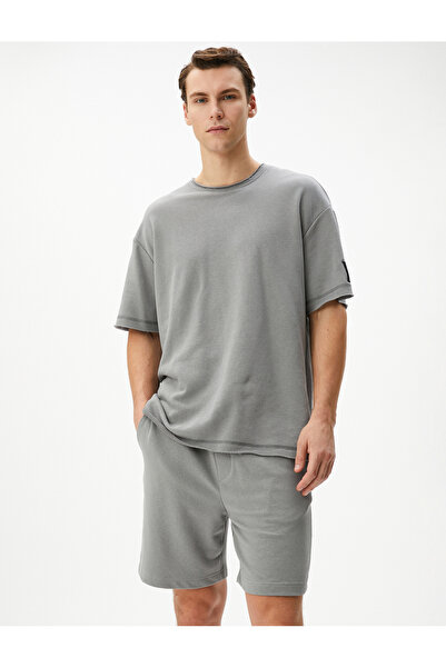 Koton Βασικό υφαντό σορτς με κορδόνια στη μέση και λεπτομέρεια τσέπης