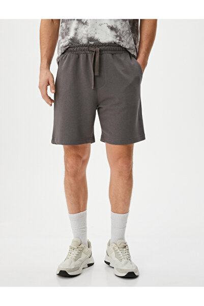 Koton Basic-Shorts aus Webstoff mit Schnürung in der Taille und Taschendetail
