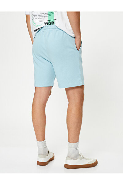 Koton Egyszerű szövött rövidnadrág fűzős derékkal és zsebrészlettel