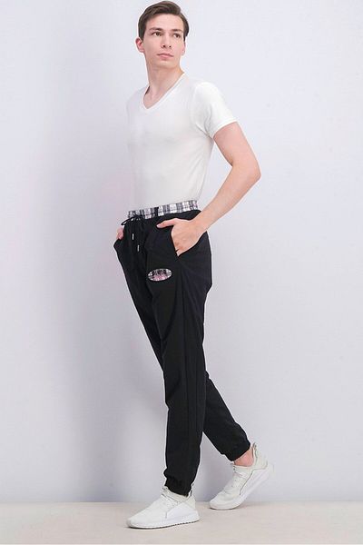 Puma Men Regular Fit Solid Brand Logo Pants, Black