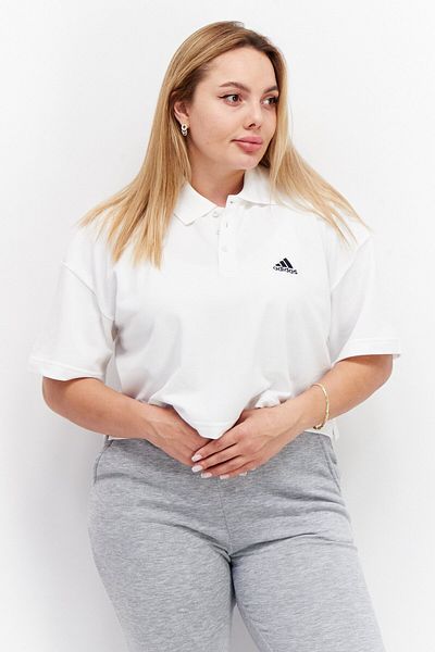 adidas قميص بولو نسائي قصير مناسب للأنشطة الخارجية، باللون الأبيض