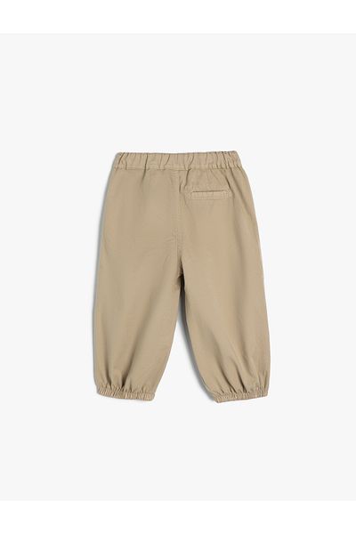 Koton Fallschirmhose Baumwolle Bequeme Passform Standardbund Elastische Beintasche
