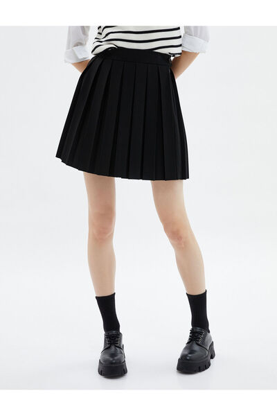 Koton İnce Piliseli Mini Etek Standart Bel Rahat Kesim