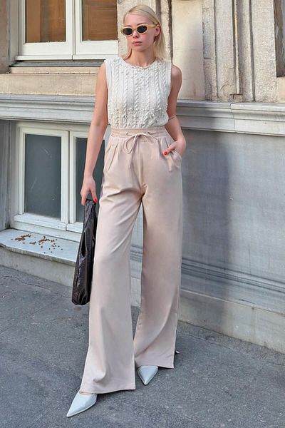 Swist Beige Damenhose mit hoher Taille und Schlitz