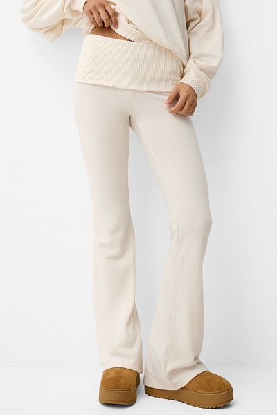 Bershka Soft-touch flared trousers with fold-over waist