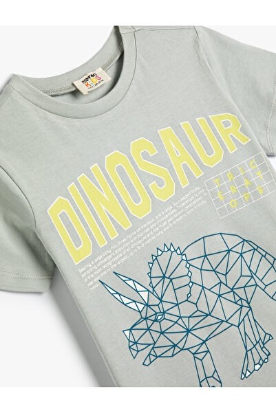 Koton Bavlněné tričko s krátkým rukávem s potiskem dinosaurů – s výstřihem