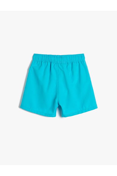 Koton Pantaloni scurți de mare, culoare care se schimbă în apă, cravată în talie, căptușit cu plasă
