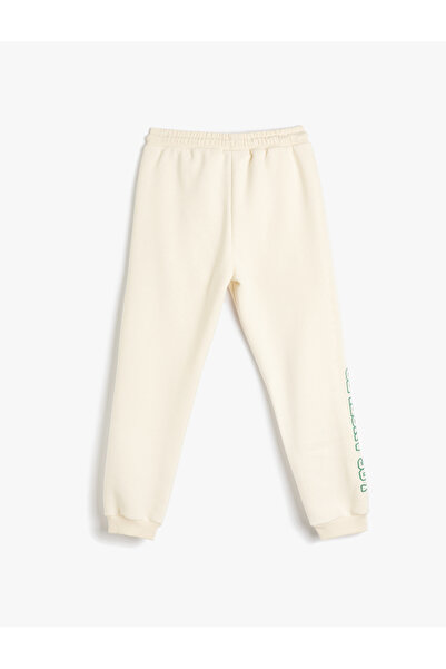 Koton Basic-Jogger-Jogginghose mit Bindegürtel und bedrucktem Taschenband