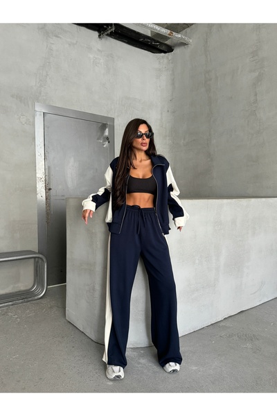 dolu butik طقم بدلة رياضية بتفاصيل مخططة من القماش