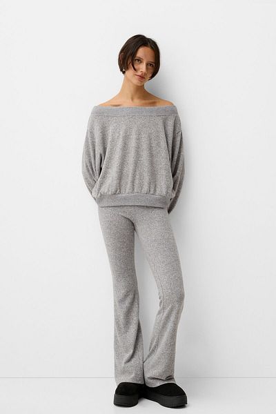 Bershka Soft-touch flared trousers with fold-over waist