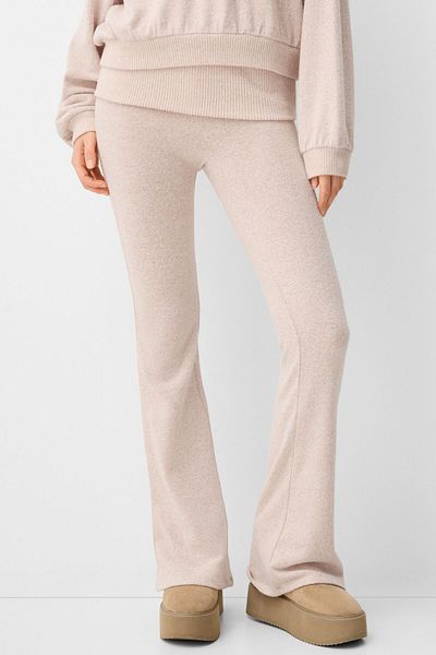 Bershka Soft-touch flared trousers with fold-over waist
