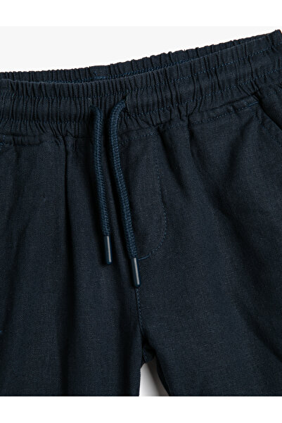 Koton Plátěné šortky se zavazováním v pase a kapsou